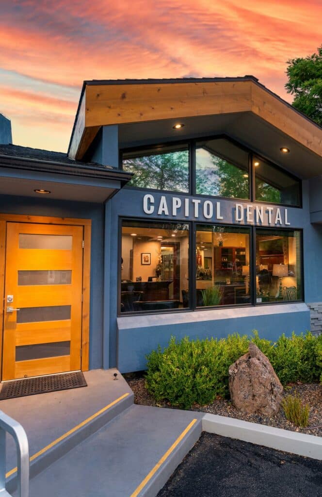 capitol dental blue building wood door sunset